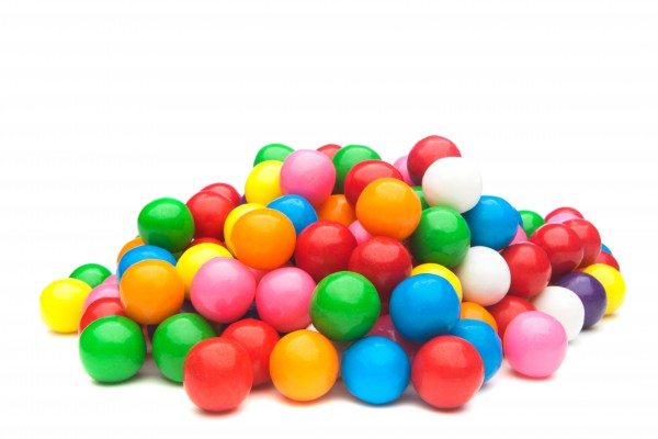 <p>A pile of colorful gumballs on a white background.</p>