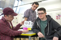 <p>Dan Thorne, Craig McFarlane and Eddie Magee, design students at the University of the Creative Arts in Epsom showing their idea of how to convey Iggesund’s environmental performance.© Iggesund</p> 